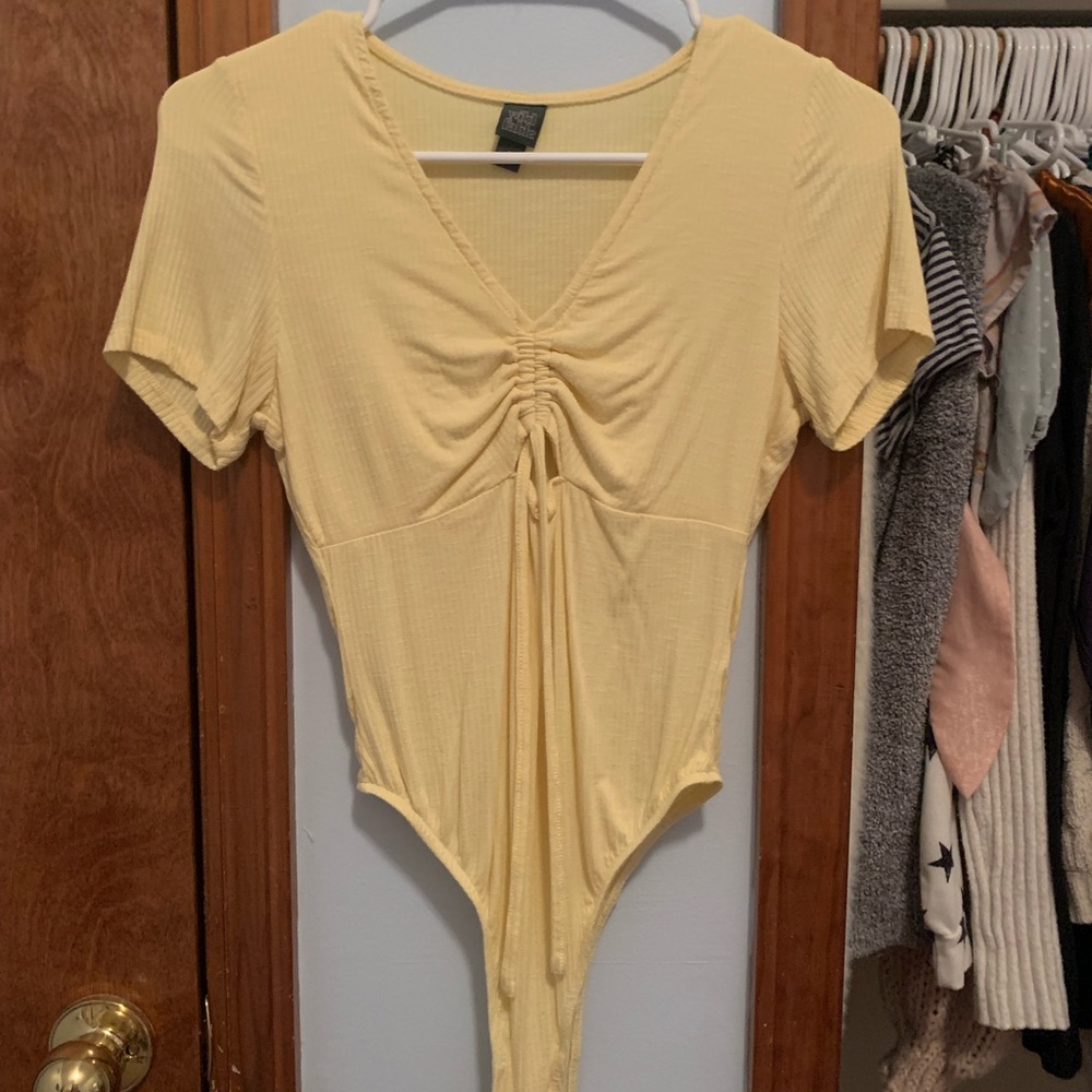 Yellow bodysuit